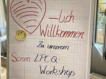 Flipchart mit Willkommensgruß zu Beginn des Lern-Prozess-Coach-Qualifizierungsworkshop