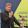 Das Bild zeigt Ministerpräsident Markus Söder bei einer Rede am Campus Burghausen.