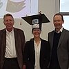 Das Bild zeigt vier Personen bei der Verteidigung der Doktorarbeit von Camille Châteauvieux .