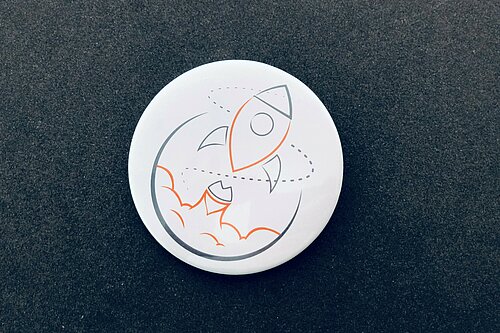 ROCkET Rakete als Icon auf schwarzem Untergrund